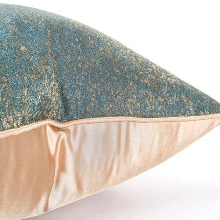 غطاء وسادة اخضر وذهبي