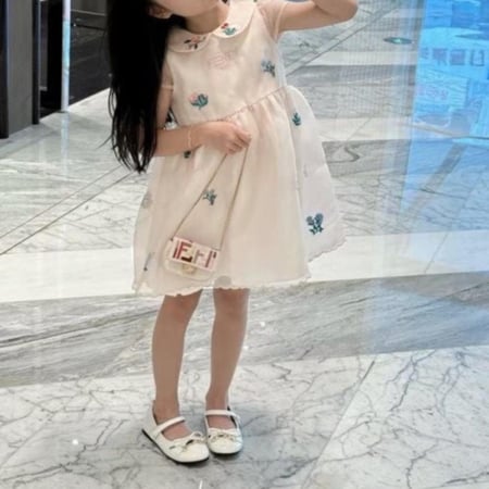 فستان وردي قماش اورقانزا وتطريز وردات وشعار فندي