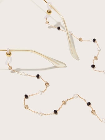 سلسال نظارات شمسية مطلي بالون الذهبي مزين بأحجار ذهبيه و سوداء و ذهبية