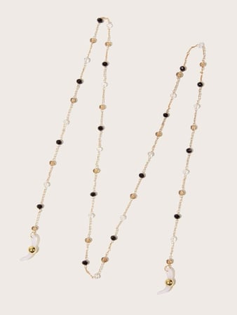 سلسال نظارات شمسية مطلي بالون الذهبي مزين بأحجار ذهبيه و سوداء و ذهبية