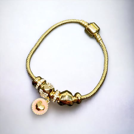 سوار باندورا لون ذهبي مع زهرة لون وردي.  MB-033