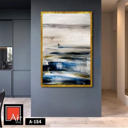 A154 لوحة تجريدية بإطار ذهبي، تجمع بين درجات الأزرق والأبيض مع تدرجات دافئة، تضيف لمسة جمالية أنيقة وحديثة للمساحات الداخلية.