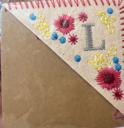 علامة مرجعية لزاوية الكتاب،  تطريز يدوي