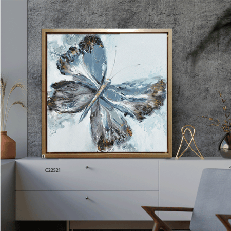 لوحة جدارية كانفس تصور فراشة بتدرجات من اللون التركواز مع الأزرق.