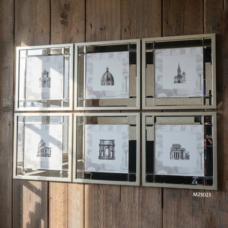 مجموعة لوحات كانفس تجمع بين الفن المعماري الكلاسيكي باطارات من المرايا .
