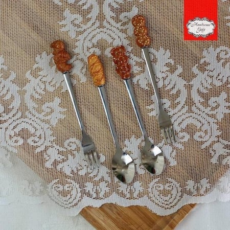 طقم ملاعق وشوك للحلى عدد اربع قطع | A set of dessert spoons and forks, four pieces