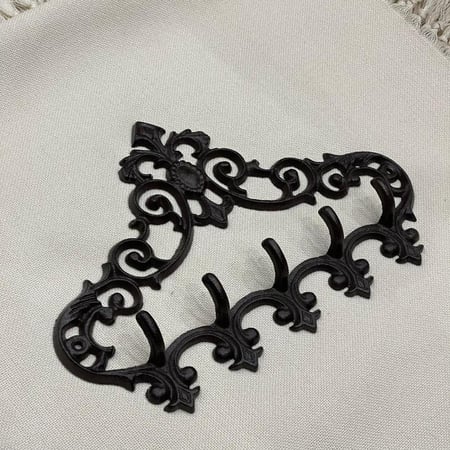 علاق جداري معدني | metal wall hanger