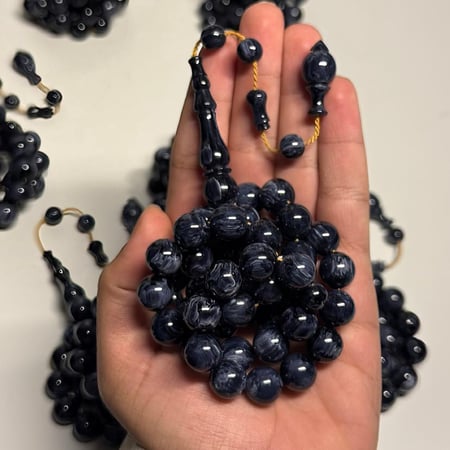 أسود رخامي خيط ذهبي