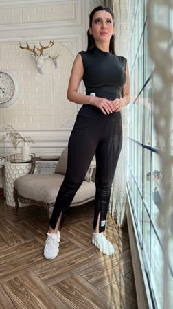 ترينق  رياضي اسود  بلوزة بدون كم