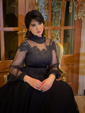 فستان سهرة أسود كلوش