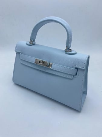 شنطة يــد - سماوي