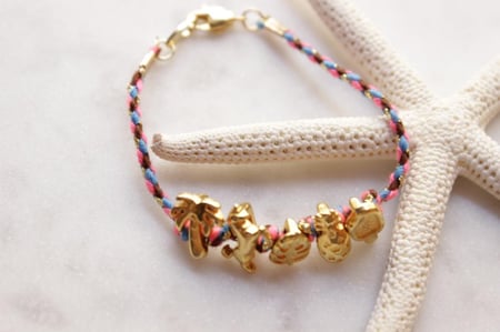 اسورة خيط مع تعليقات مطلية ذهب