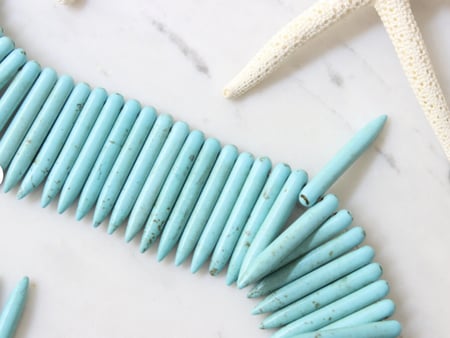 حجر الهوليت التركواز ع شكل سبايكي