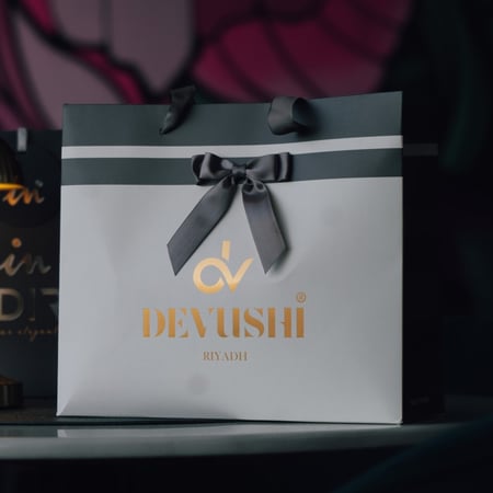 ساعة نسائية ديفوشي جلد بلون رمادي