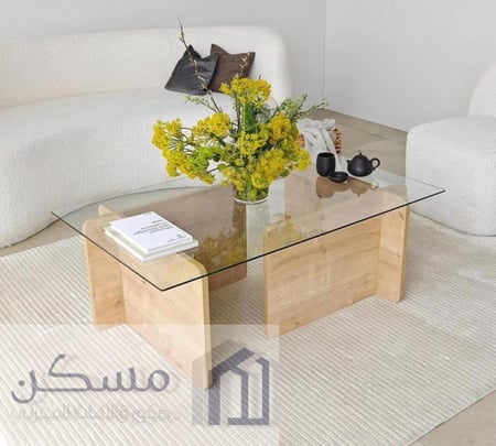 طاولة قهوة وسطية بسطح زجاج وقاعدة بديل الرخام