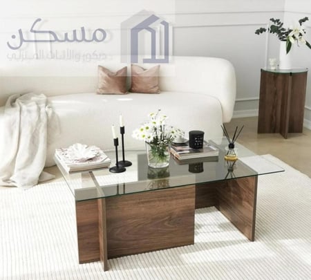 طاولة قهوة وسطية بسطح زجاج وقاعدة بديل الرخام
