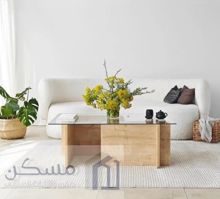 طاولة قهوة وسطية بسطح زجاج وقاعدة بديل الرخام