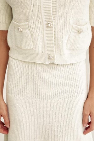 جاكيت محبوك مزين بجيوب