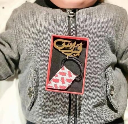 بروش الشماغ بالاسم