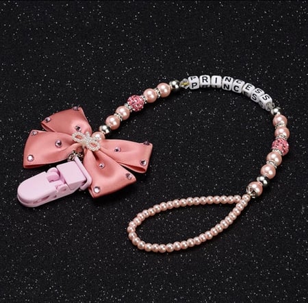 حاملة اللهاية وتعليقة انيقة وردي (المصاصة)