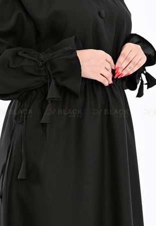 عباية كتف عليها ربطة