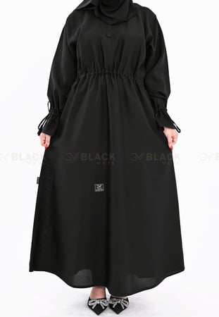 عباية كتف عليها ربطة