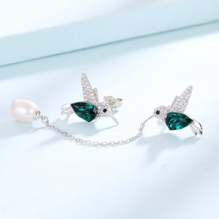 اقراط طائر القرمز