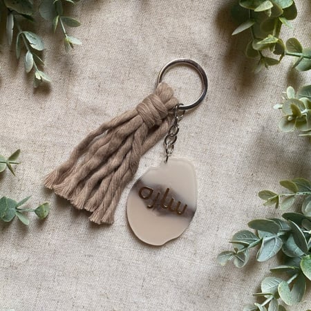 ميدالية مفاتيح ومكرمية بيجيات