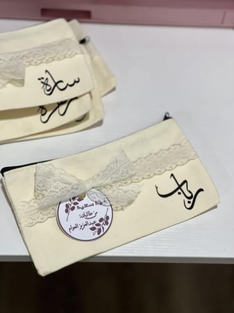 محفظة مع طباعة الاسم