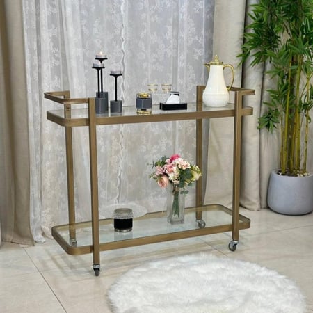 عربة تقديم حديد ذهبي