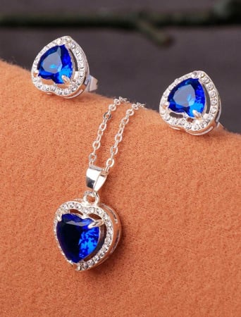 سلسال القلب الازرق مع اقراط