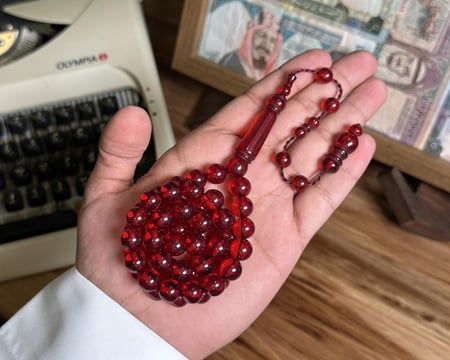 بكلايت احمر شفاف تمليكه