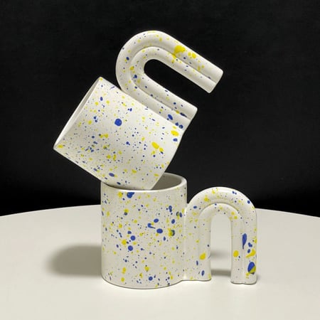 كوب سيراميك بتصميم مقبض الباب