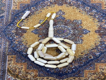 عظم النعام ٣٣ خرزه قص صنوبري ٥ ملي