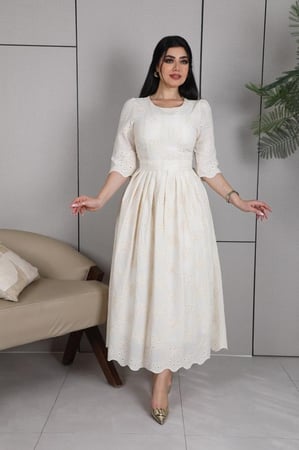 فستان ميدي انيق بقصة واسعة من تحت اللون بيج