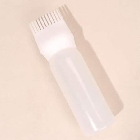 فرشاة توزيع الزيت للشعر