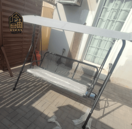 أرجوحة حديقة مع مظلة