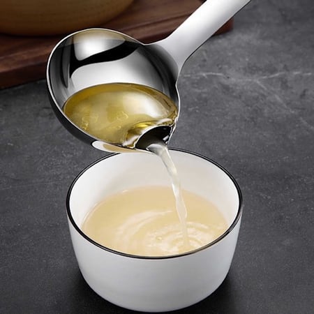 ملعقة عازل زيت