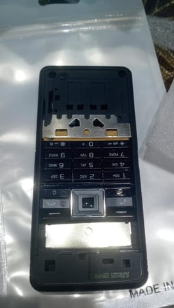 غطاء وكفر جوال سوني إريكسون C902 كامل مع لوحة المفاتيح معدني لون احمر ولون اسود