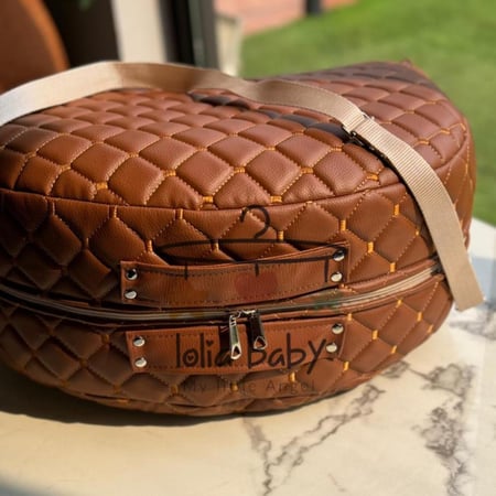 سرير متنقل جلد جملي