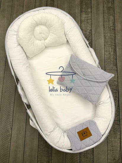 سرير متنقل رمادي مناسب للجنسين