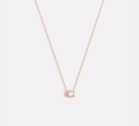 عقد نسائي من كوتش باللون الروز قولد