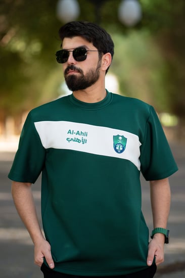 تيشرت الأهلي أخضر بشريط أبيض مائل