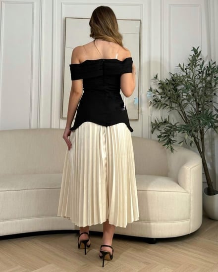 فستان سهرة بفتحة من الظهر