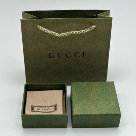 سوارة قوتشي ستيل فضي