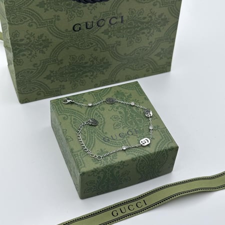 سوارة قوتشي ستيل فضي