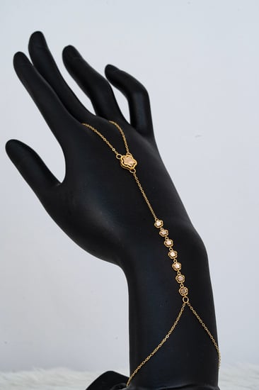 كف مع خاتم وردة الجوري 7 وردات – ذهب عيار 21