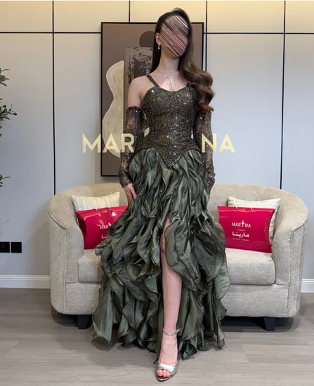 فستان تولاي (فستان زيتي صدريه شك سهره وكسرات كرنكل لمعه اكمام منفصله)