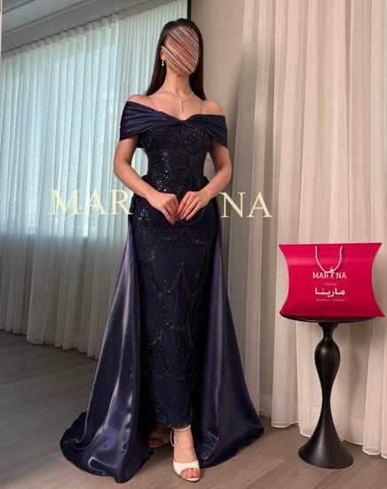 فستان رمشه(فستان كحلي شك سهره فيونكه وذيل ميكادو لمعه)