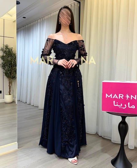 فستان مارتيا كحلي (فستان كحلي شك مزين بالورود تدخيله جورجيت)